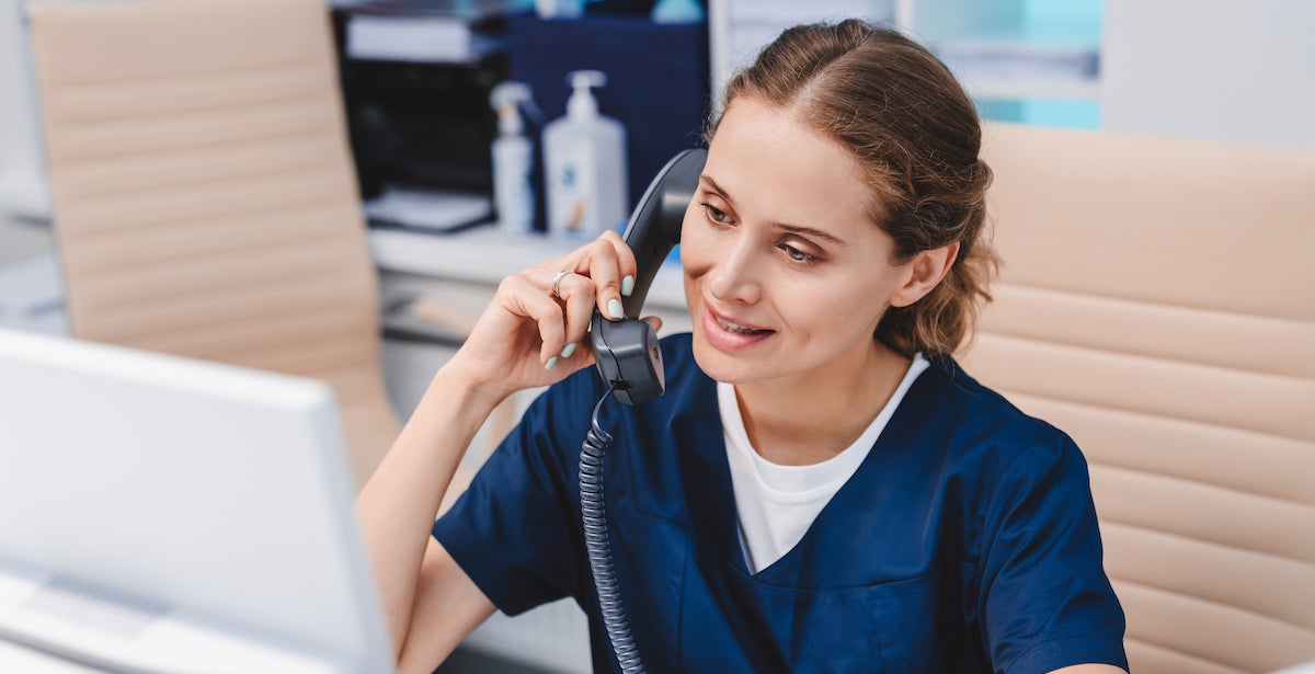 nurse-administrator-on-phone