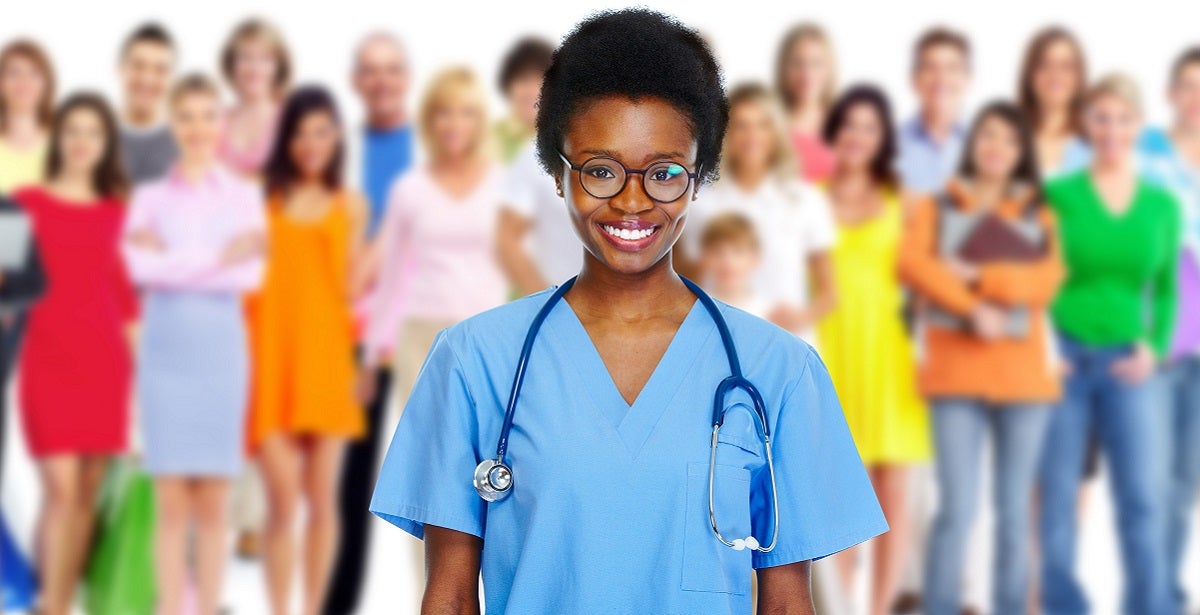 Public health nurse in front of a group of people